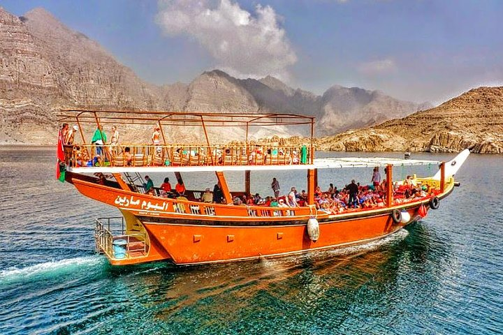 Experience stunning mountain views and charming villages as you cruise on a traditional dhow savoring a delicious buffet of Arabic and Asian cuisine while enjoying refreshing drinks.